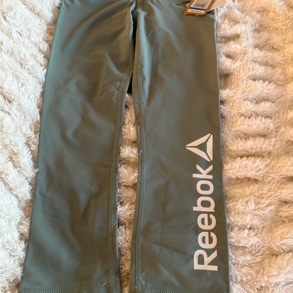 Reebok Women's Capris - Set of 4 1-Mint, 1-Silver, 1-Black and 1 black short. - Picture 2 of 14